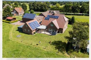 Haus kaufen in 26529 Leezdorf, Großzügiges vermietetes EFH mit Terrasse & Weitblick ins Grüne