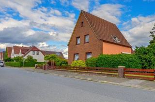 Haus kaufen in 28779 Bremen, Gut aufgeteiltes Zweifamilienhaus mit Doppelgarage und weiteren großartigen Extras in Bremen-Lüssum-Bockhorn