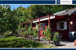 Haus kaufen in 91522 Stadt, Idyllisch gelegenes Wochenendhaus mit Einbauküche, Duschbad, PV-Anlage, Solar u. Carport