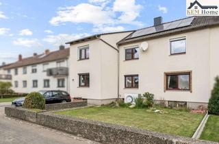 Haus kaufen in 31698 Lindhorst, Großzügiges Zweifamilien-Reihenendhaus mit Garten in familienfreundlicher Lage