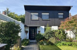 Einfamilienhaus kaufen in 64546 Mörfelden-Walldorf, Schönes Einfamilienhaus mit individuellem Charme