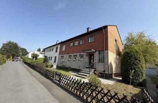 Doppelhaushälfte kaufen in 63225 Langen, Zweifamilien-Doppelhaushälfte im Grünen mit großem Grundstück und Potenzial