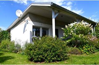 Haus kaufen in 18574 Gustow, Ferienbungalow in idyllischer Lage von Drigge mit Bootsanlegeplatz