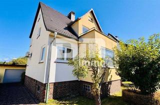 Einfamilienhaus kaufen in 34266 Niestetal, Gepflegtes Einfamilienhaus auf großem Grundstück mit Garage, Terrasse und Balkon