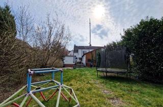 Doppelhaushälfte kaufen in 64807 Dieburg, Ruhige Lage: Doppelhaushälfte mit eingewachsenem Garten und Nebengebäude in Dieburg