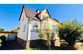 Einfamilienhaus kaufen in 34266 Niestetal, Gepflegtes Einfamilienhaus auf großem Grundstück mit Garage, Terrasse und Balkon