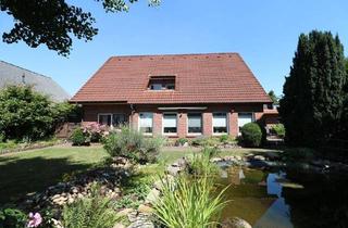 Haus kaufen in 49661 Cloppenburg, Cloppenburg - Stadtzentrales, schickes Wohnhaus mit Garagenanbau, Carport und schönem Garten