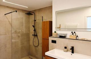 Wohnung kaufen in 63801 Kleinostheim, Kleinostheim - Charmante 2-Zimmer-Wohnung mit großem Sonnenbalkon in zentraler Lage von Kleinostheim