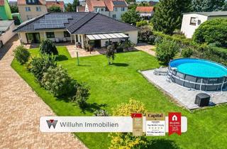 Haus kaufen in 04509 Löbnitz, Löbnitz - Einzigartiges Mehrgenerationenwohnen im Bungalowstil | Wunderschönes Grundstück | Pool | Erdwärme