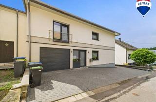Einfamilienhaus kaufen in 66663 Merzig / Menningen, Merzig / Menningen - Modernes EinZweifamilienhaus mit großzügigem Raumangebot