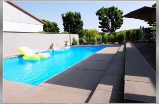 Haus kaufen in 55597 Wöllstein, Wöllstein - +++Poolhaus in ruhiger naturnaher Lage+++