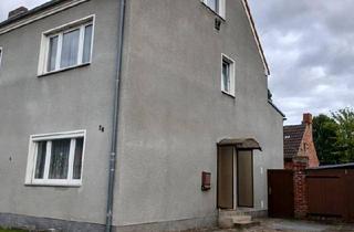 Mehrfamilienhaus kaufen in 18507 Grimmen, Grimmen - Mehrfamilienhaus mit großem Garten