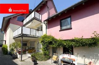 Wohnung kaufen in 63533 Mainhausen, Großzügige Maisonettewohnung mit 5 Zimmern, 2 Küchen und 2 Balkonen – Wohnen mit Hauscharakter