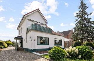 Haus kaufen in 25499 Tangstedt, Kapitalanlage – Großes Zweifamilienhaus mit Einliegerwohnung und herrlichem Grundstück in Tangstedt