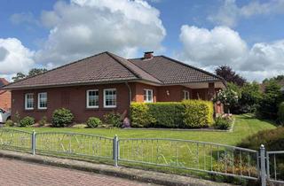 Haus kaufen in 26529 Upgant-Schott, Großer Winkelbungalow mit ebenerdiger Wohnfläche