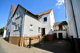Haus kaufen in 35457 Lollar, Stilvolles Wohnen mit Garten und Stellplatz in zentraler Lage von Lollar