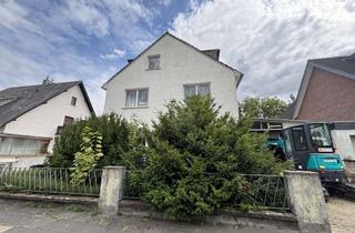 Haus kaufen in 51061 Höhenhaus, Dreifamilienhaus mit Garagen in Köln
