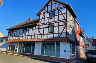 Gewerbeimmobilie kaufen in 37276 Meinhard, Kleines Wohnhaus mit Gewerbefläche und Garage