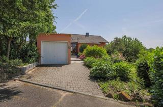 Haus kaufen in 75196 Remchingen, Remchingen-Wilferdingen - Wohnen im Grünen: Zeitloser Bungalow mit Gartenparadies