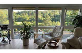 Einfamilienhaus kaufen in 61239 Ober-Mörlen, Ober-Mörlen - Wunderschönes Haus mit Einliegerwohnung in Hanglage - Platzwunder