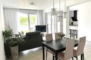 Wohnung kaufen in 33129 Delbrück, Erdgeschosswohnung mit gehobener Ausstattung im Neubaugebiet