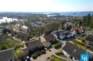 Haus kaufen in 24306 Plön, Aussicht, die begeistert – Logenplatz über Plöns Seenlandschaft