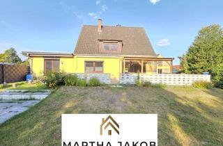 Einfamilienhaus kaufen in 28876 Oyten, Modernisiertes Einfamilienhaus mit 5 Zimmern, 2 Garagen, großem Garten und viel Nutzfläche in Oyten!