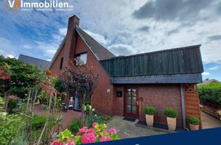 Doppelhaushälfte kaufen in 24783 Osterrönfeld, Familienfreundliche Doppelhaushälfte mit zusätzlichem Mieteinnahme-Potenzial