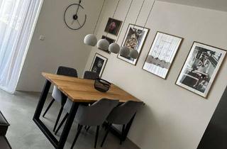 Wohnung mieten in 72793 Pfullingen, Exklusive 2-Zimmer-Erdgeschosswohnung mit Einbauküche und Balkon Pfullingen (Ortsmitte)