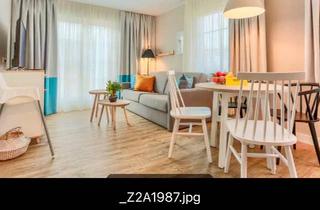Wohnung kaufen in 24837 Schleswig, Schleswig - Kapitalanlage Beech Resort Flesensee