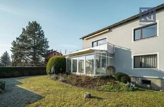 Haus kaufen in 97230 Estenfeld, Estenfeld - Großzügiges Haus mit 2 Wohneinheiten, Ausbauoption und Gartenparadies