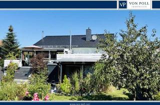 Haus kaufen in 35423 Lich, Lich - Zeit Los - Zweifamilienhaus mit Wintergarten, Pool und stilvoller Wohnvielfalt