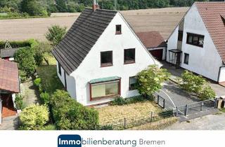 Einfamilienhaus kaufen in 28719 Bremen, Bremen - Freistehendes Einfamilienhaus mit beheiztem Wintergarten und Garage