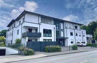Wohnung kaufen in 33758 Schloß Holte-Stukenbrock, Attraktive Erdgeschosswohnung mit Terrasse und Tiefgaragenstellplatz