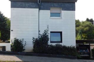 Wohnung kaufen in Westersburg 31, 42719 Wald, Attraktive Maisonette-Wohnung mit Garten, Wintergarten und Garage