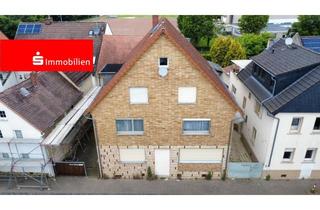 Mehrfamilienhaus kaufen in 35398 Gießen, Mehrfamilienhaus mit drei Wohneinheiten, Garage und Garten