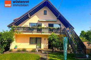 Haus kaufen in 56753 Naunheim, Großzügiges Zweifamilienhaus mit Garten, Garagen & Ausbaupotenzial in Naunheim