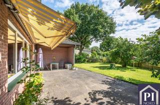 Haus kaufen in 24793 Brammer, Wohnen auf einer Ebene - Winkelbungalow mit Garage und Doppelcarport