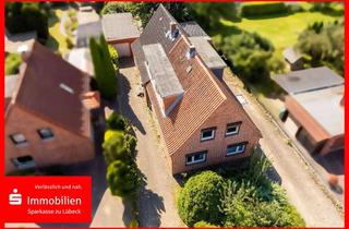 Haus kaufen in 23617 Stockelsdorf, Sanierungsobjekt oder Baugrundstück? Doppelhaus mit zwei Garagen