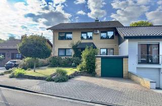 Haus kaufen in 41836 Hückelhoven, Hückelhoven-Schaufenberg: Zweifamilienhaus von 1968, Aufstockung 1986