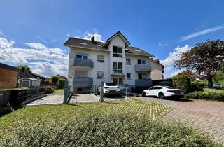 Wohnung kaufen in 63674 Altenstadt, Einzigartig & gemütlich: DG-Wohnung mit EBK, Eckbadewanne und Doppelgarage