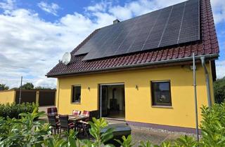 Einfamilienhaus kaufen in 17509 Brünzow, Einfamilienhaus in Ortsrandlage, unverbaute Sicht, Erdwärme, Solar, Stromspeicher, 3 Garagen, Kamin