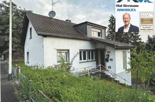 Einfamilienhaus kaufen in Nussbaumweg, 50321 Brühl, Freistehendes, charmantes Einfamilienhaus in Brühl-Badorf mit großem Grundstück