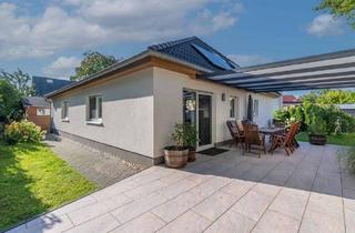 Haus kaufen in 14612 Falkensee, Falkensee - KENSINGTON - EXKLUSIV - Bungalow mit separatem Studio im Obergeschoss und terrassiertem Garten!