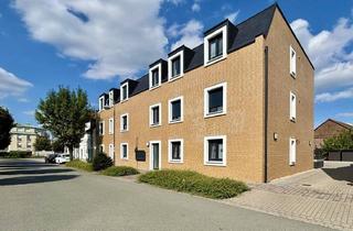 Wohnung kaufen in Teichstraße 12, 06792 Sandersdorf, Sandersdorf-Brehna - Energieeffiziente Eigentumswohnung im Erdgeschoss mit Terrasse und Garten im Herzen von Sandersdorf