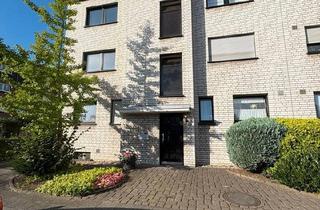 Wohnung kaufen in 47447 Moers, Moers - Masionette-Wohnung mit Garten,Balkon & Garage - Sanierungsobjekt