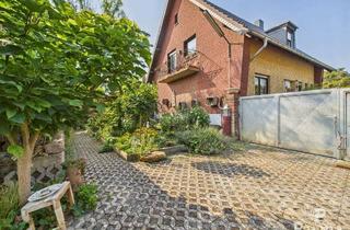 Haus kaufen in 52382 Niederzier, Freistehendes Zweifamilienhaus in Niederzier mit Potential und großem Grundstück