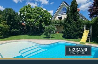 Einfamilienhaus kaufen in Eisenbahnstr. 17, 79426 Buggingen, Buggingen - BRUMANI | Modernes Einfamilienhaus mit hochwertigem Anbau, Doppelgarage und Pool in Buggingen