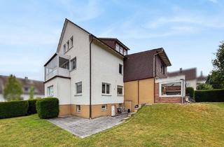Haus kaufen in 61267 Neu-Anspach, Vielseitiges Wohn- und Geschäftshaus mit Praxis, Wintergarten und großem Garten in Anspach