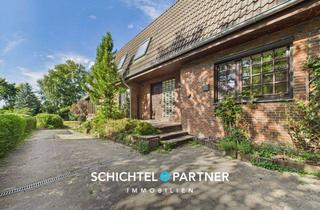 Haus kaufen in 27726 Worpswede, Worpswede | Exklusives Zweifamilienhaus mit großem Garten und zwei Garagen